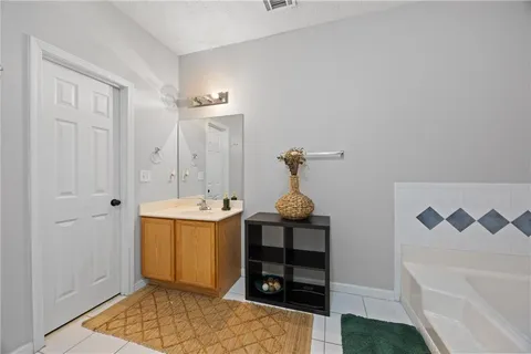 a bathroom with a sink and a bathtub