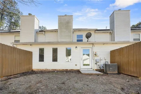 a view of a front of house with a garage