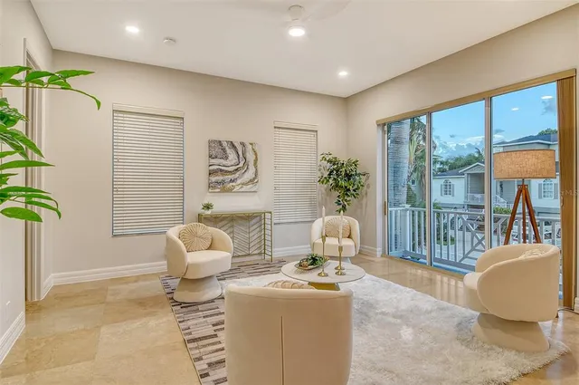 a living room with a couch and a stove top oven