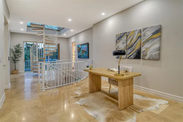 a view of an entryway and livingroom