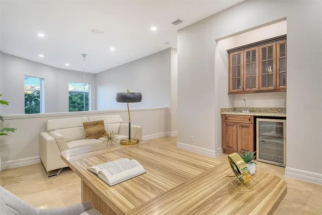 a view of an empty room and wooden floor