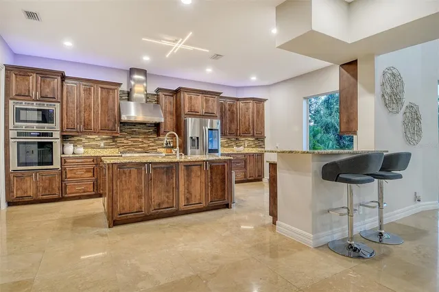 a living room with furniture fireplace and a flat screen tv