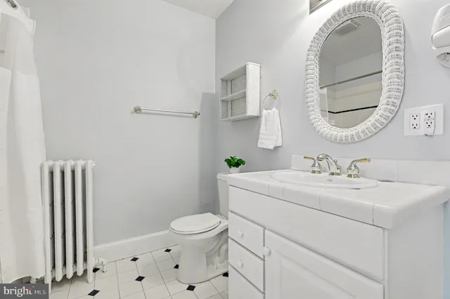 a view of empty room with wooden ceiling