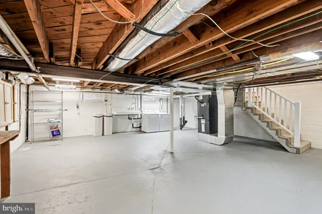 a view of an empty room with stairs
