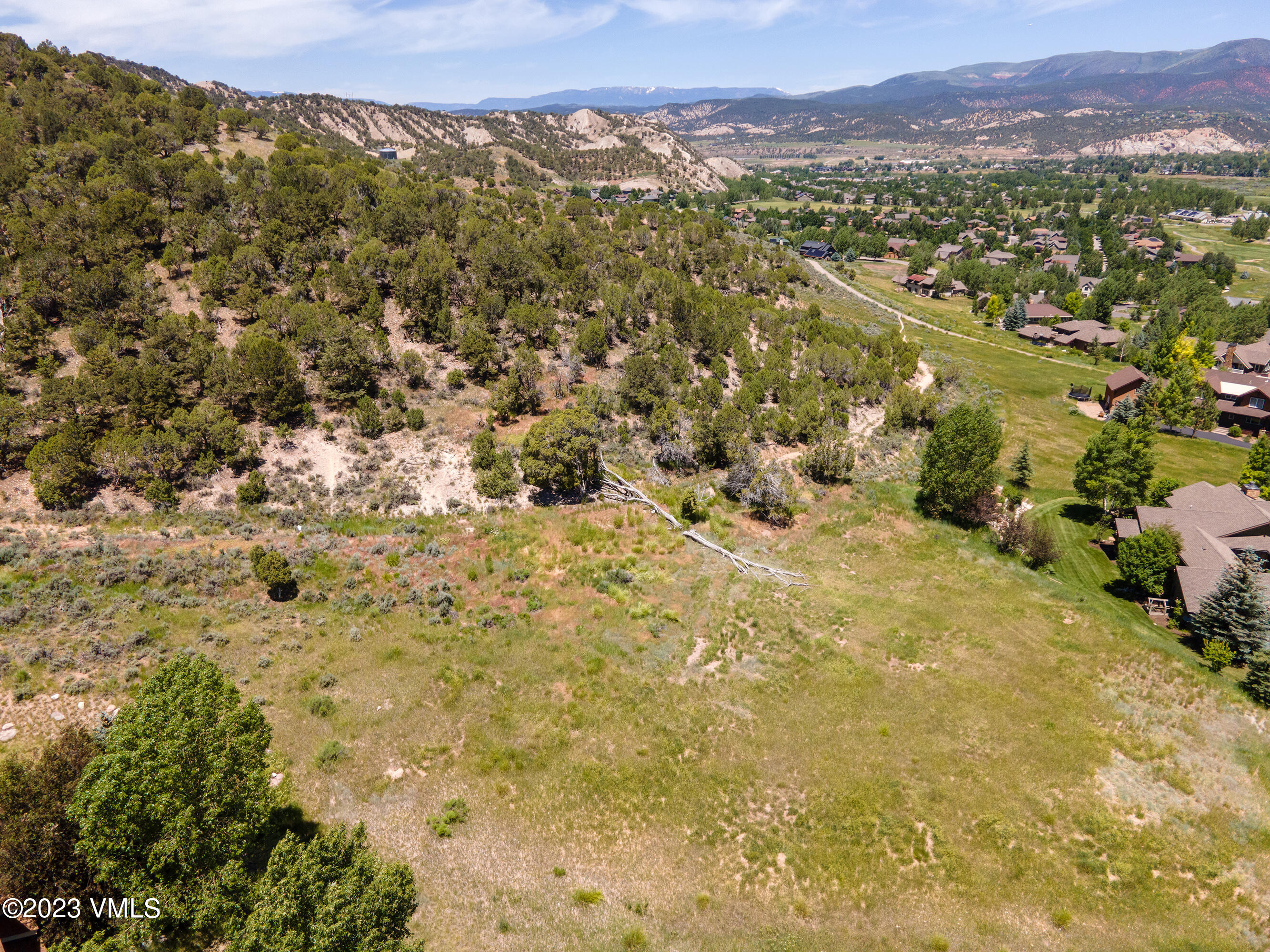 58 Lone Spur Eagle, CO 81631 - Photo 16 of 22 a view of a city with mountains in the background