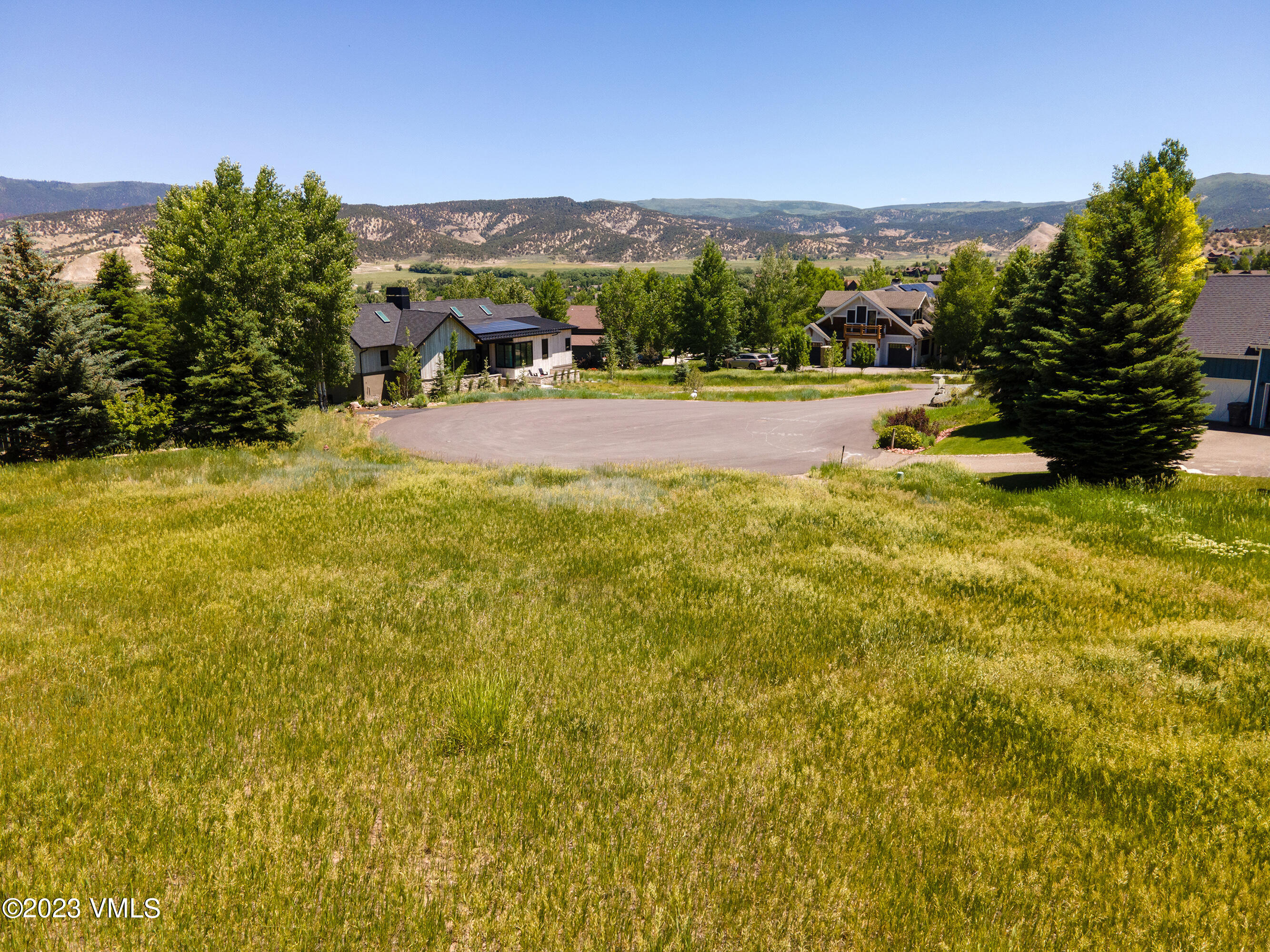 58 Lone Spur Eagle, CO 81631 - Photo 20 of 22 a view of swimming pool with outdoor seating and mountain view
