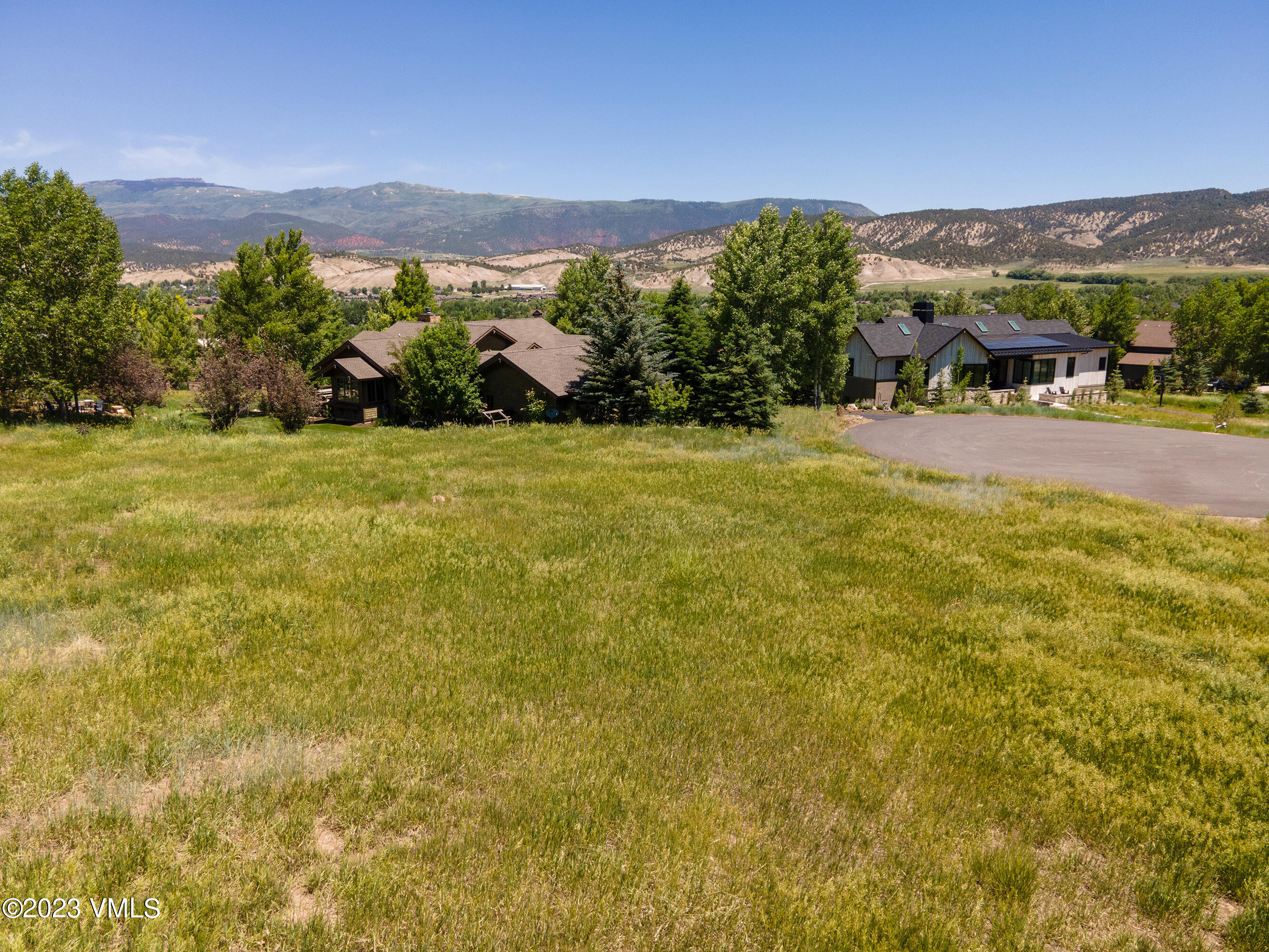 58 Lone Spur Eagle, CO 81631 - Photo 21 of 22 a view of building with yard