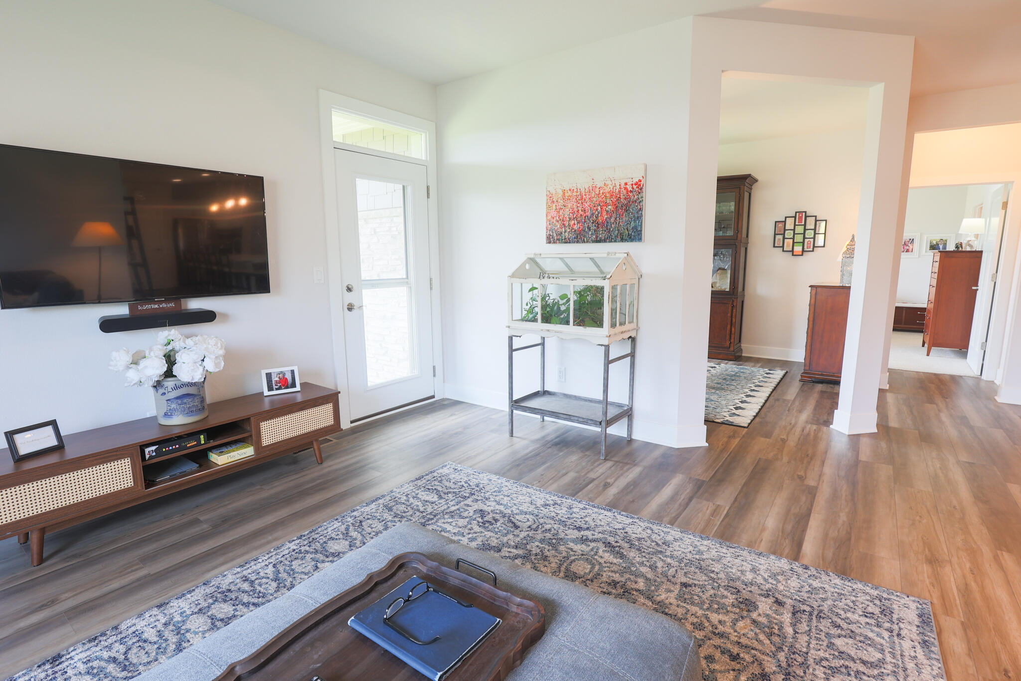 N28W25158 Pkwy Rdg Circle, Unit B Pewaukee, WI 53072 - Photo 33 of 86 Great room with floor to ceiling fireplace and door to balcony