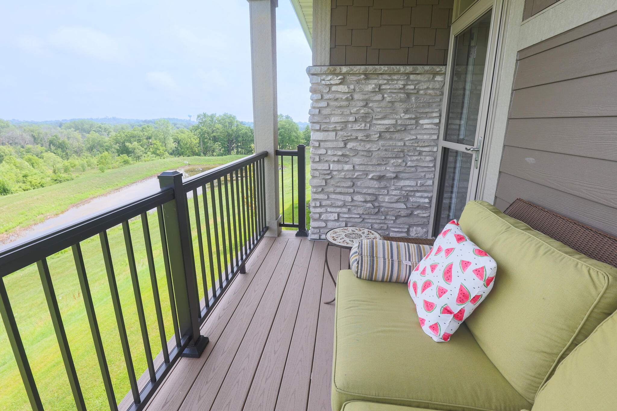 N28W25158 Pkwy Rdg Circle, Unit B Pewaukee, WI 53072 - Photo 62 of 86 Deck overlooking Walking Trails, Pond, and Pewaukee River Parkway