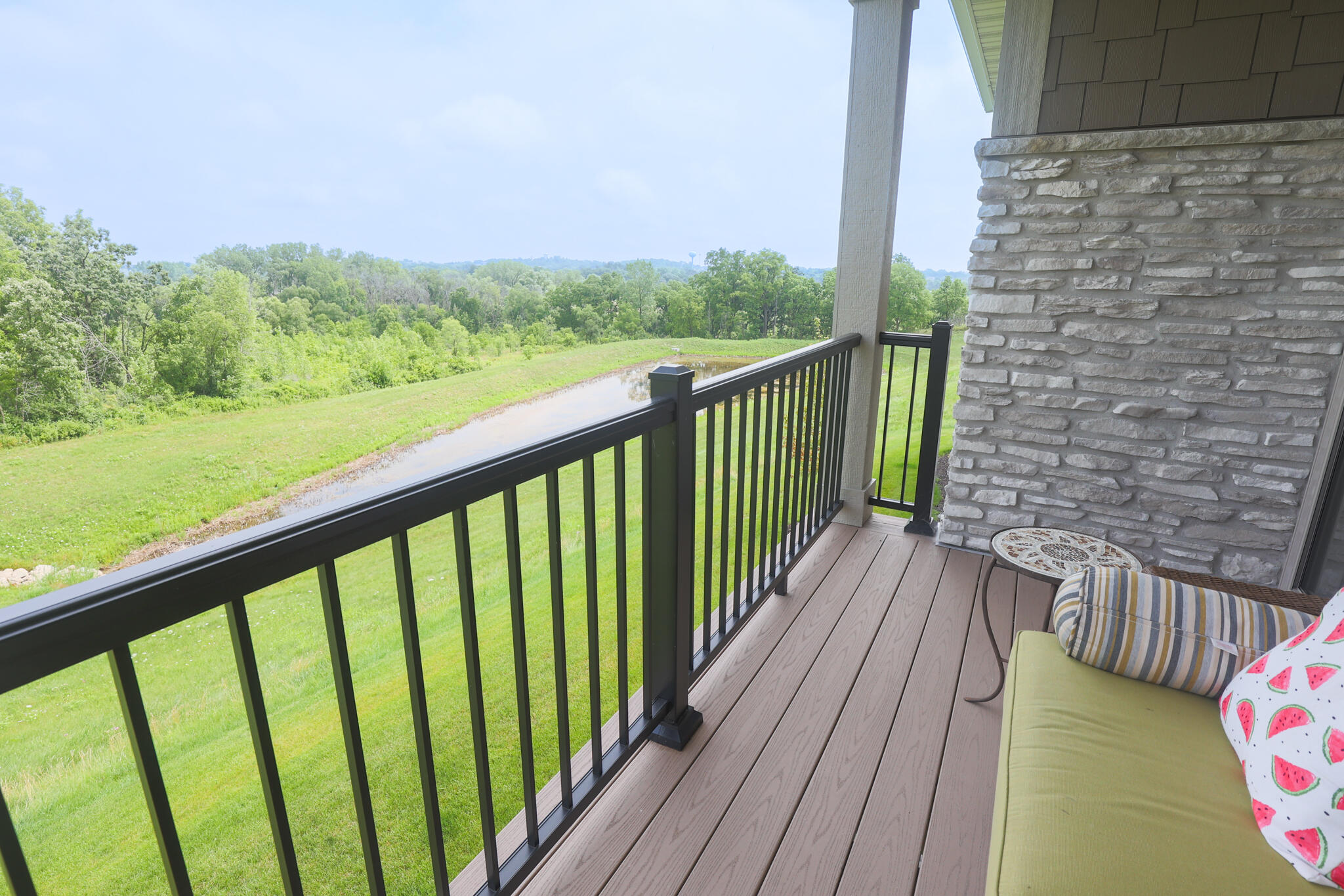 N28W25158 Pkwy Rdg Circle, Unit B Pewaukee, WI 53072 - Photo 63 of 86 Deck overlooking Walking Trails, Pond, and Pewaukee River Parkway
