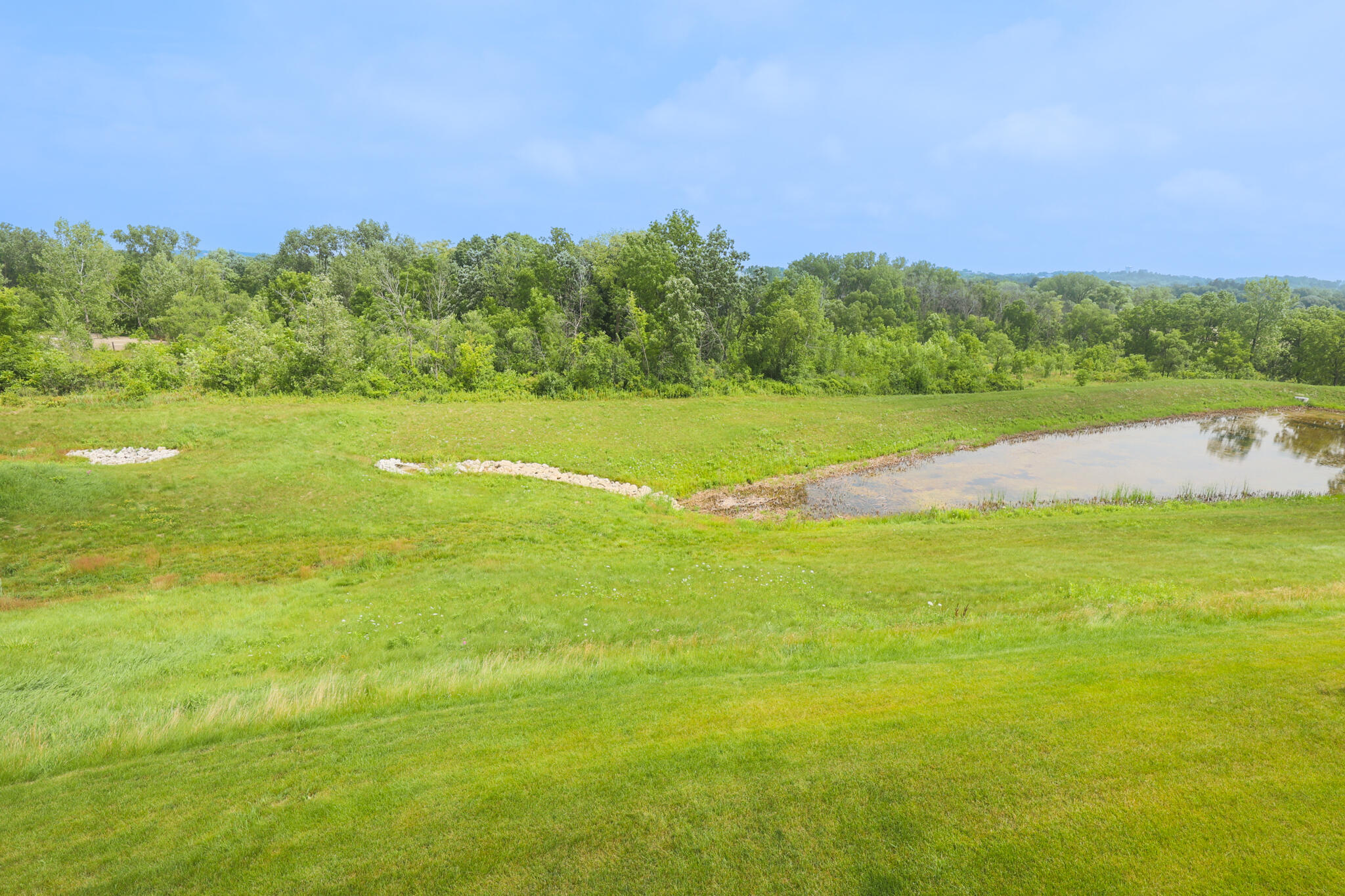 N28W25158 Pkwy Rdg Circle, Unit B Pewaukee, WI 53072 - Photo 64 of 86 Views from Unit overlooking Walking Trails, Pond, and Pewaukee River Parkway