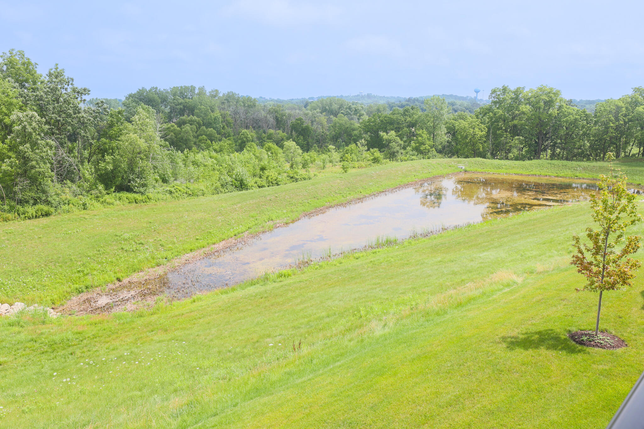 N28W25158 Pkwy Rdg Circle, Unit B Pewaukee, WI 53072 - Photo 65 of 86 Views from Unit overlooking Walking Trails, Pond, and Pewaukee River Parkway