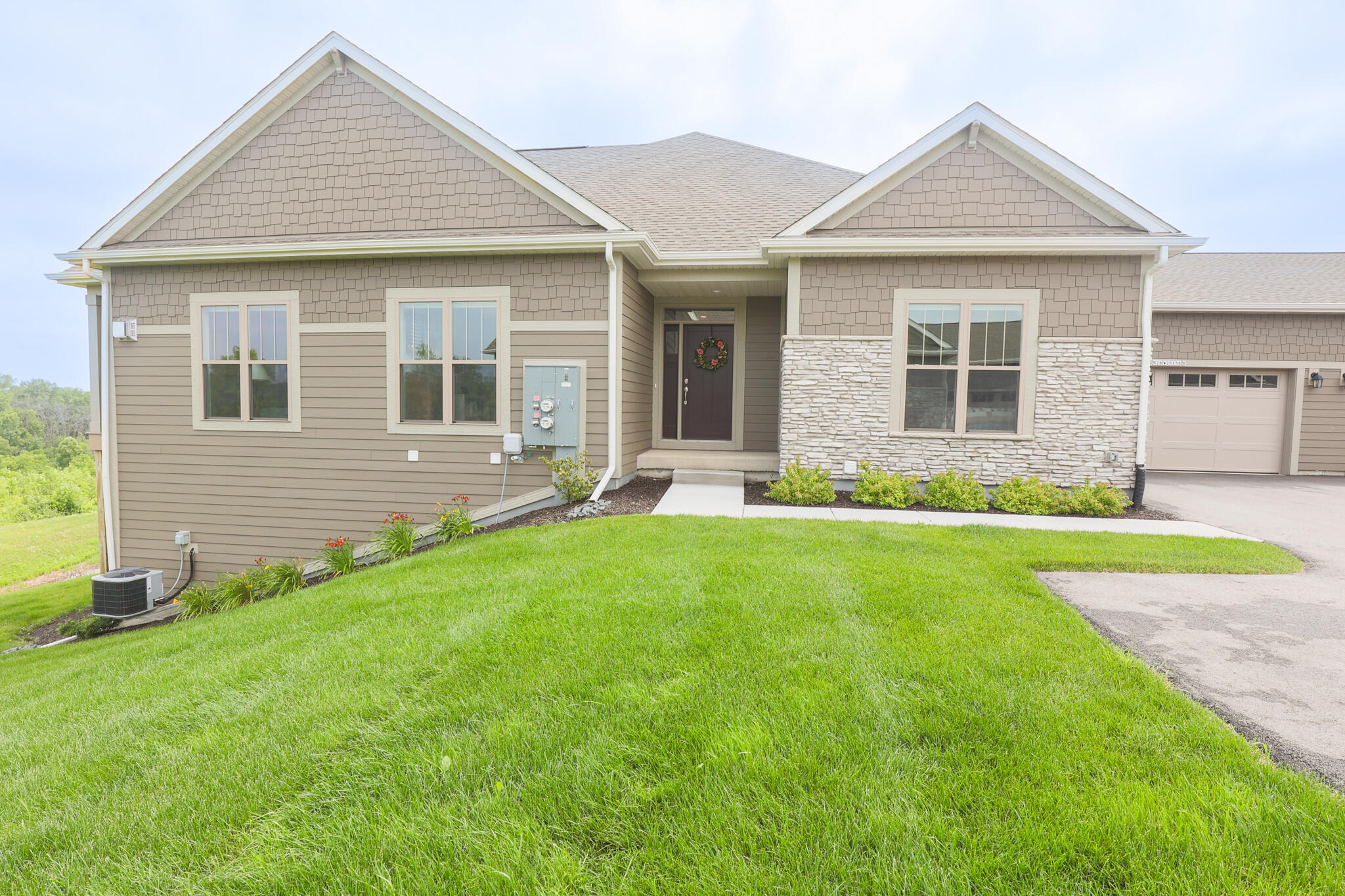 N28W25158 Pkwy Rdg Circle, Unit B Pewaukee, WI 53072 - Photo 66 of 86 Private Entrance and 2 car garage