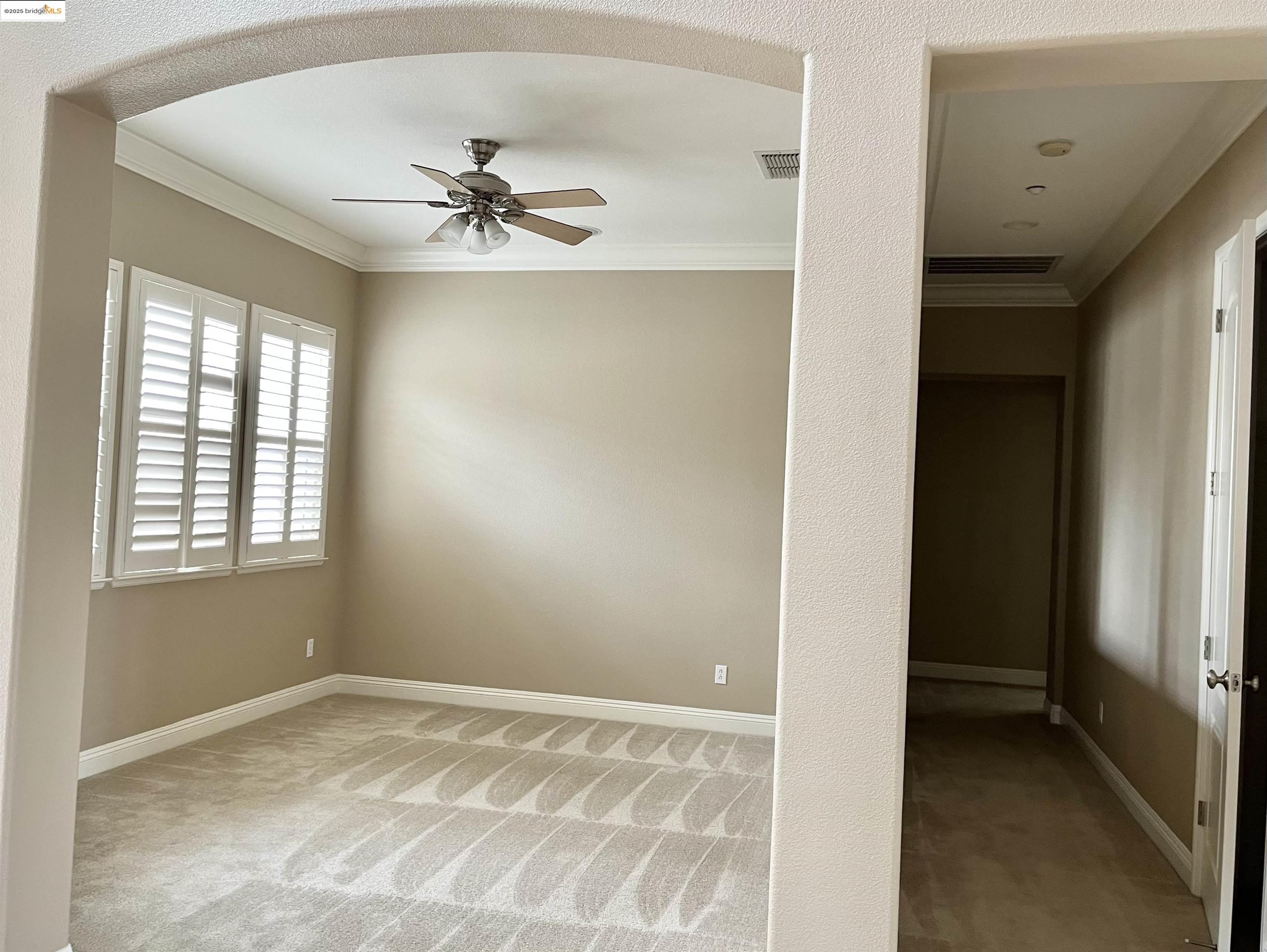 2497 Winged Foot Road Brentwood, CA 94513 - Photo 5 of 16 a view of an empty room with a window