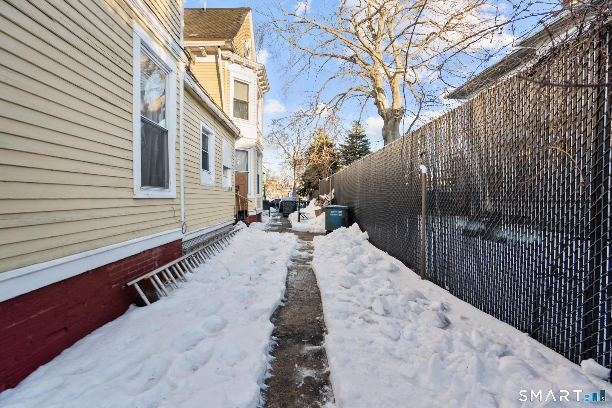349 Noble Avenue Bridgeport, CT 06608 - Photo 5 of 33 a view of a pathway with a backyard