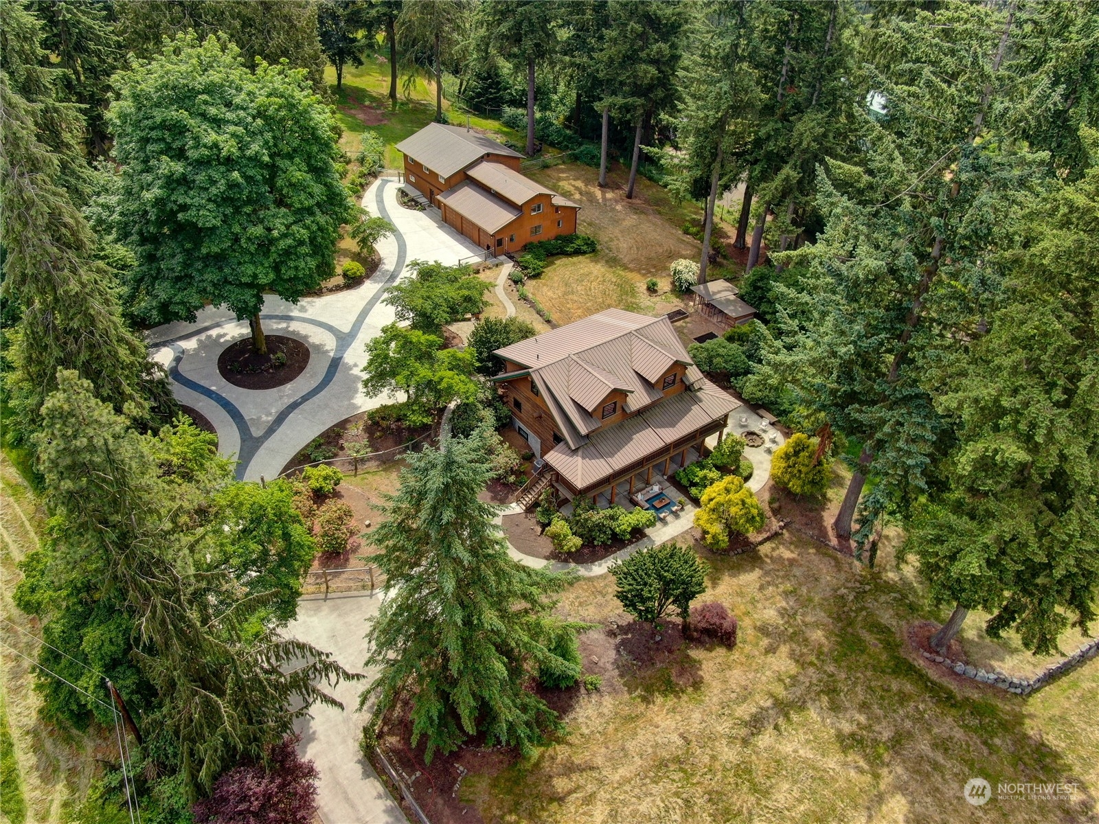 18724 High Rock Road Monroe, WA 98272 - Photo 1 of 39 an aerial view of a house with garden space and street view