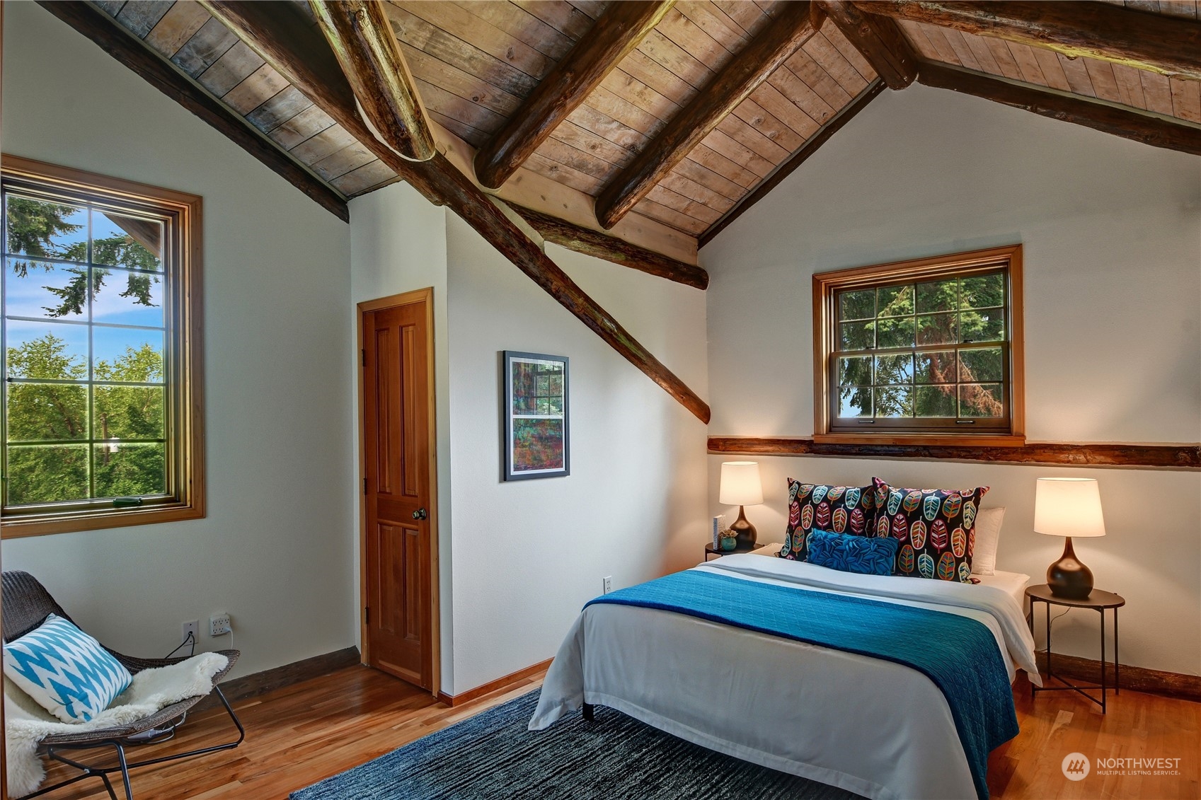 18724 High Rock Road Monroe, WA 98272 - Photo 12 of 39 a bedroom with bed and wooden floor