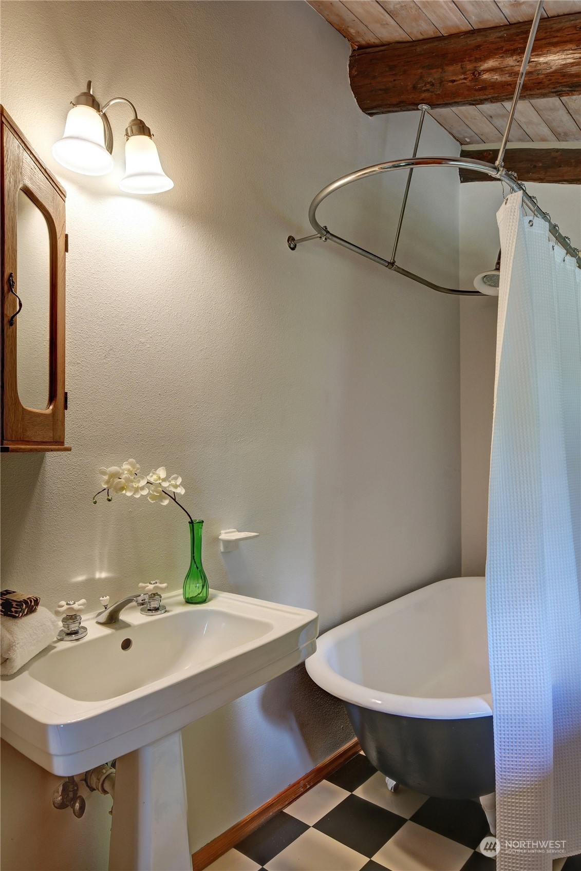 18724 High Rock Road Monroe, WA 98272 - Photo 15 of 39 a bathroom with a sink and mirror