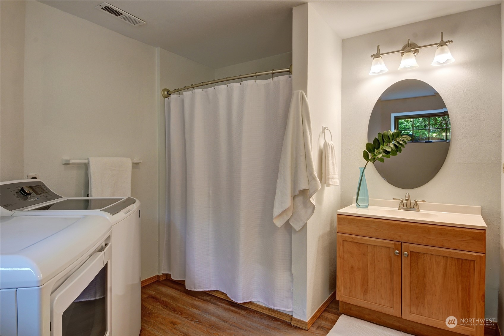 18724 High Rock Road Monroe, WA 98272 - Photo 20 of 39 a room with a sink and a mirror