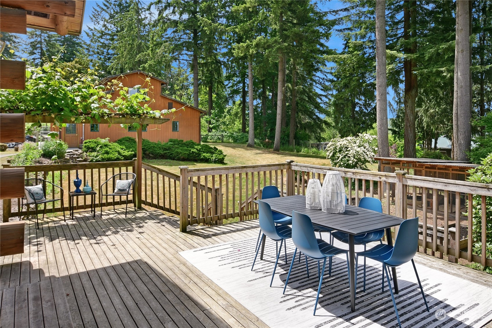 18724 High Rock Road Monroe, WA 98272 - Photo 23 of 39 a view of a deck patio and outdoor seating