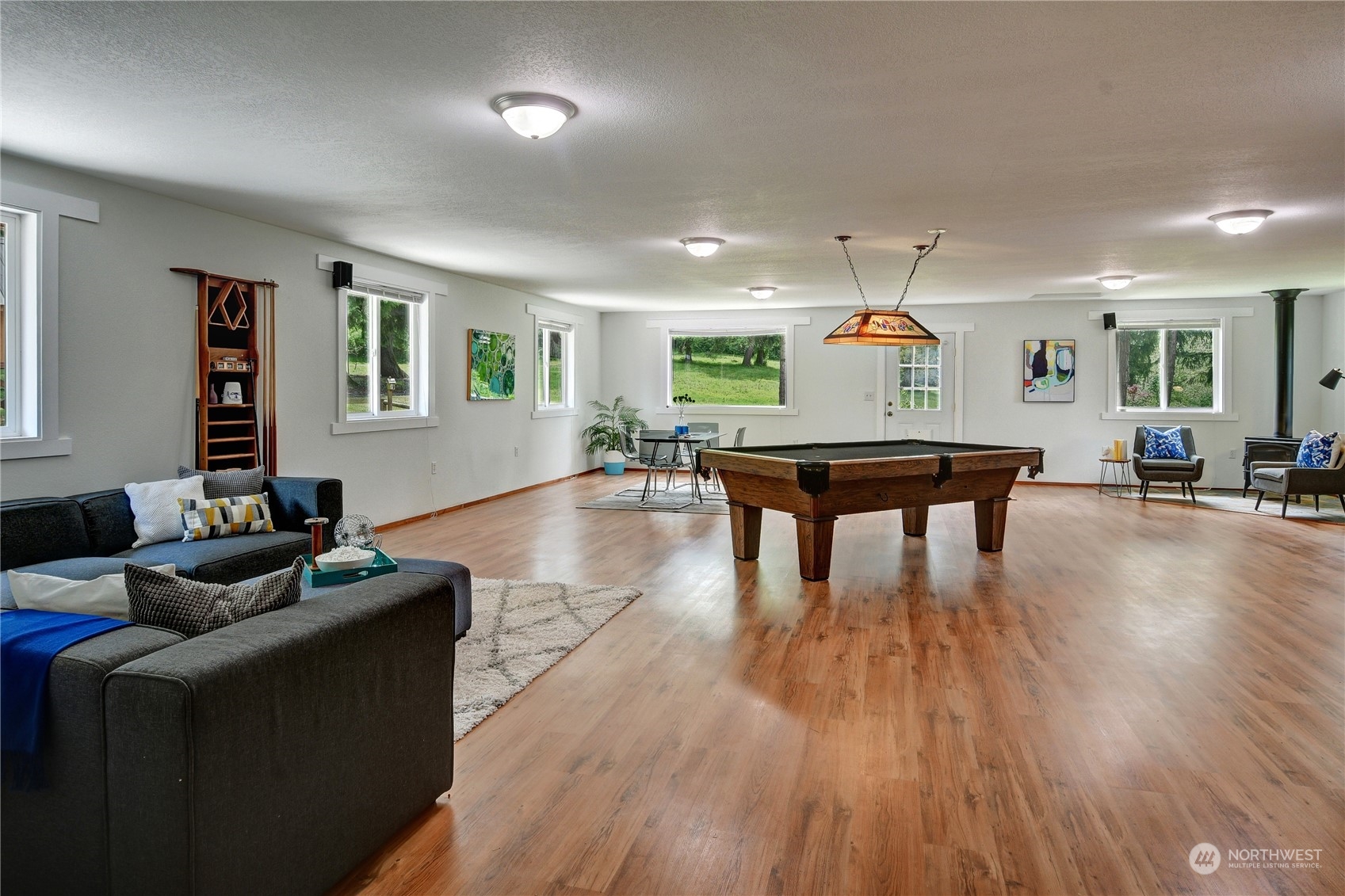 18724 High Rock Road Monroe, WA 98272 - Photo 31 of 39 a living room with furniture and a wooden floor