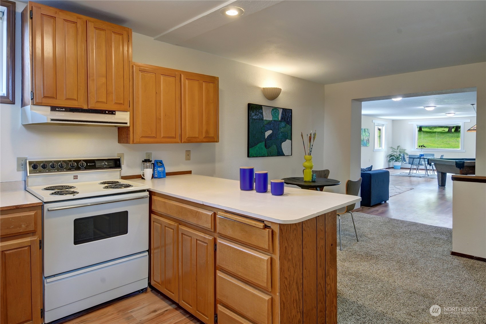 18724 High Rock Road Monroe, WA 98272 - Photo 34 of 39 a kitchen that has a sink and a stove in it