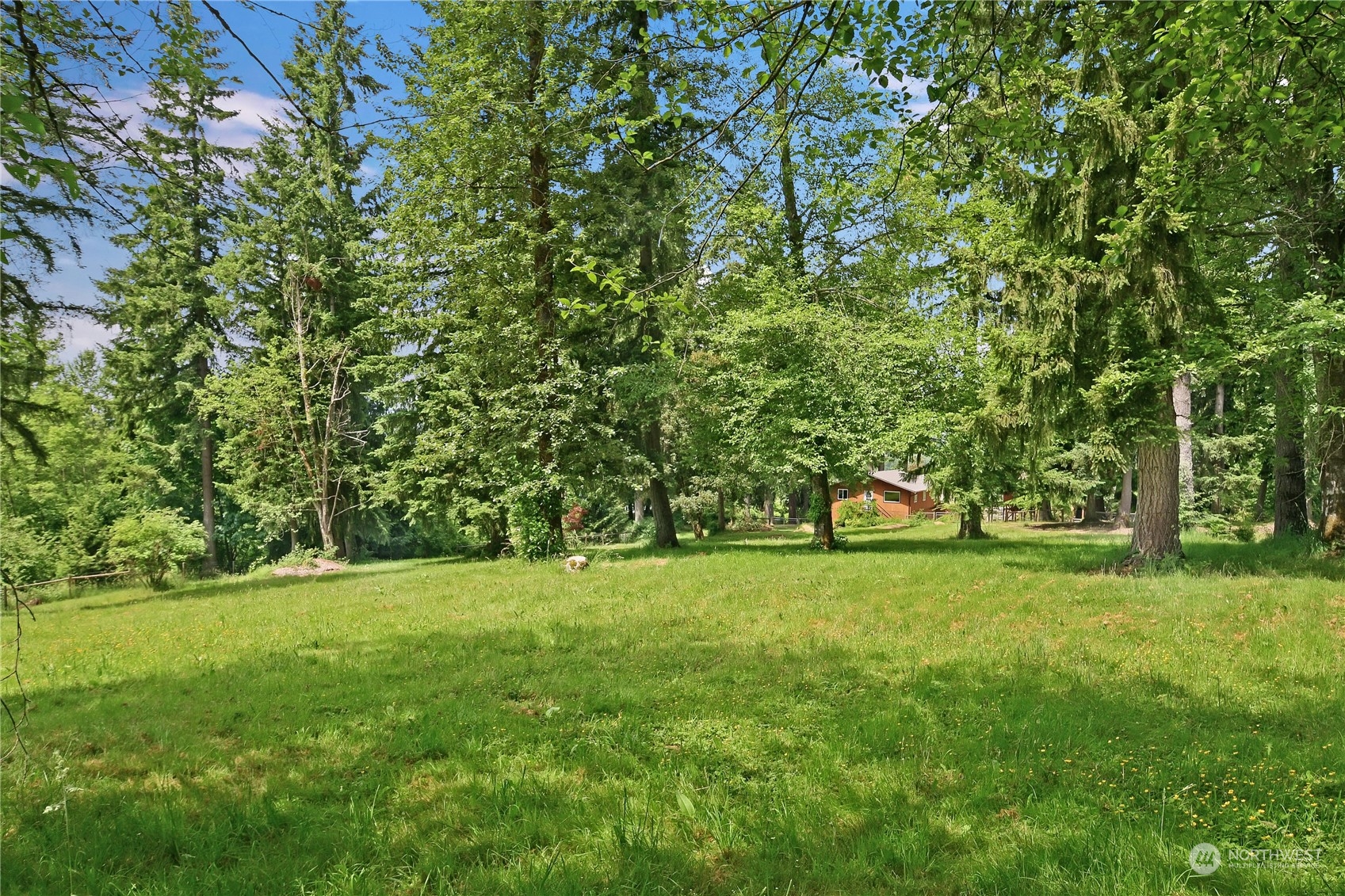 18724 High Rock Road Monroe, WA 98272 - Photo 38 of 39 a view of a field with trees in the background
