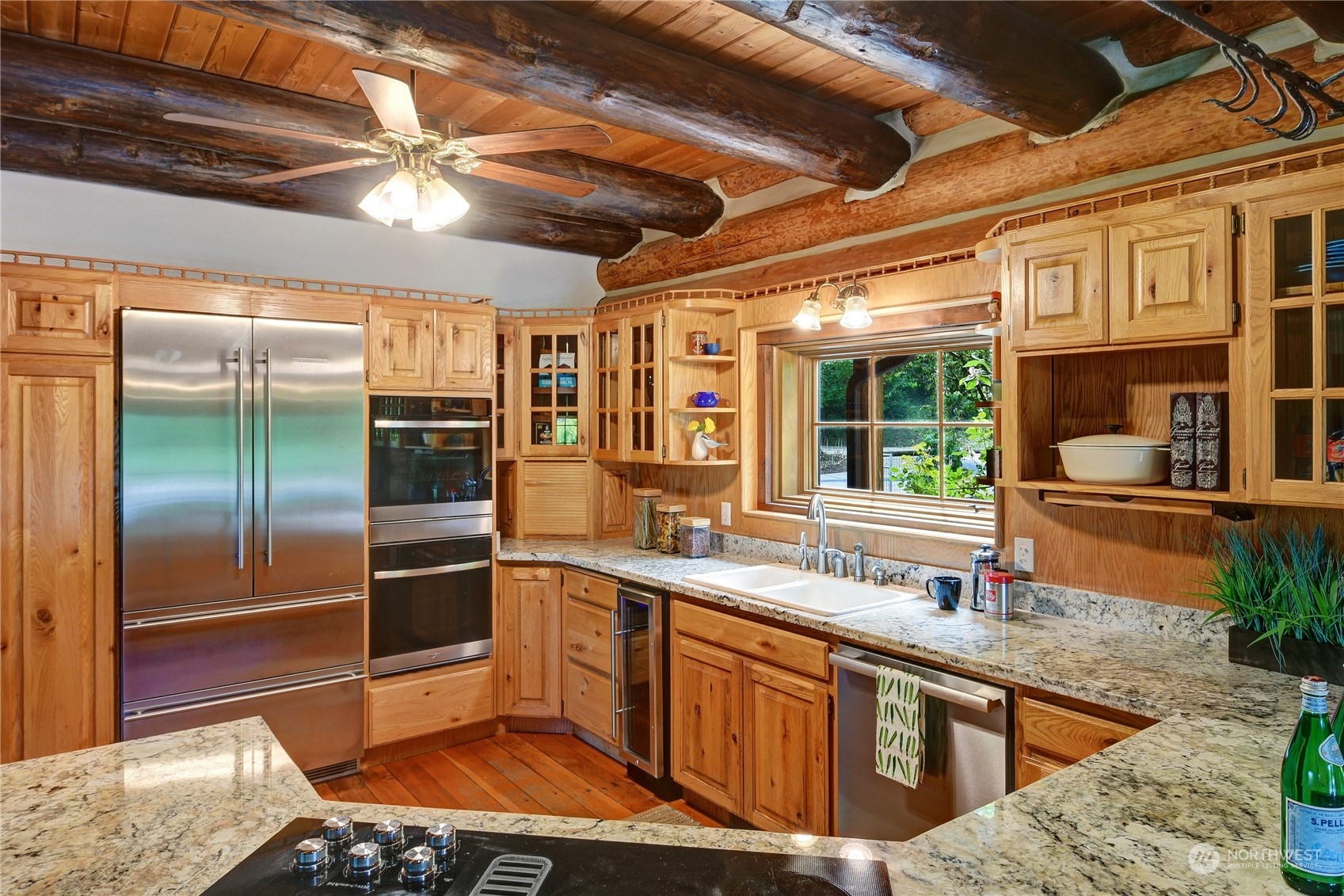 18724 High Rock Road Monroe, WA 98272 - Photo 5 of 39 a kitchen with stainless steel appliances granite countertop a sink a stove and a refrigerator