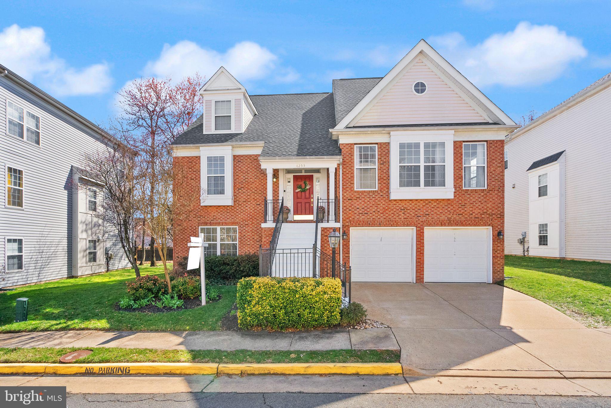 6253 Sibel Place Alexandria, VA 22310 - Photo 1 of 74 a front view of a house with garden