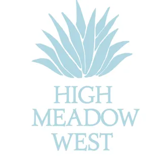 a childrens park with lots of swings slides and swimming pool in the back