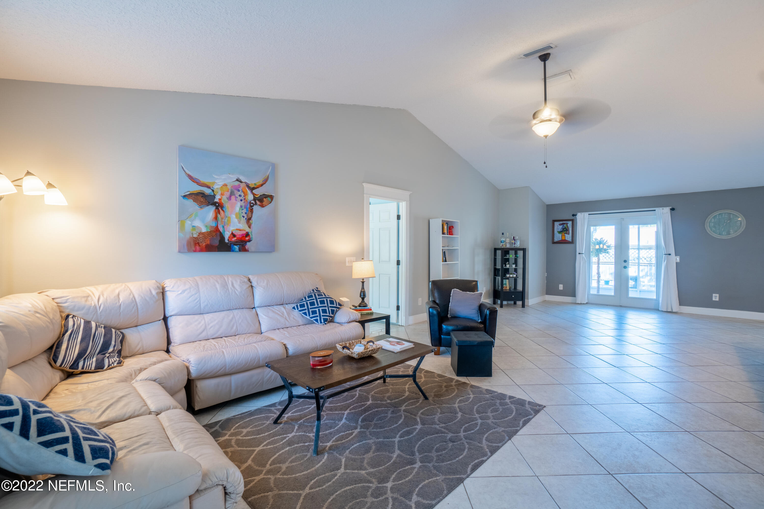 115 Nautilus Road St. Augustine, FL 32086 - Photo 4 of 23 a living room with furniture and wooden floor