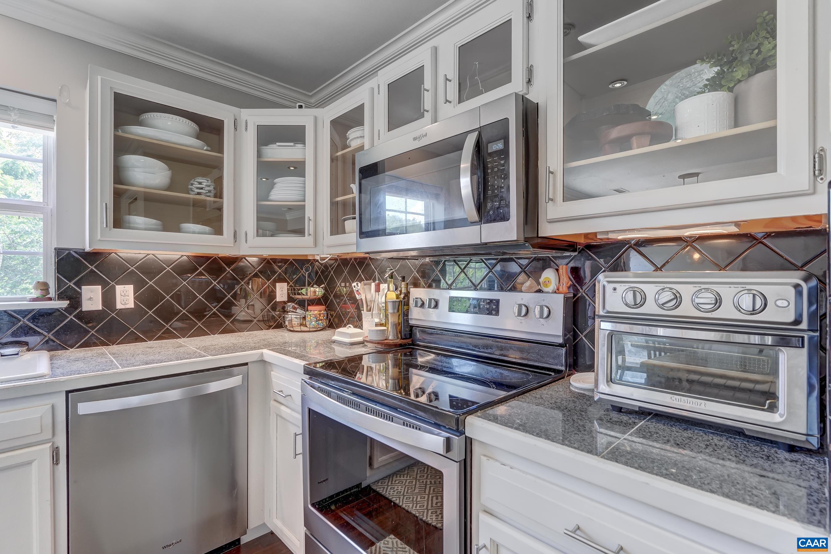 1069 Amber Ridge Road Charlottesville, VA 22901 - Photo 13 of 46 a kitchen with a stove and a sink