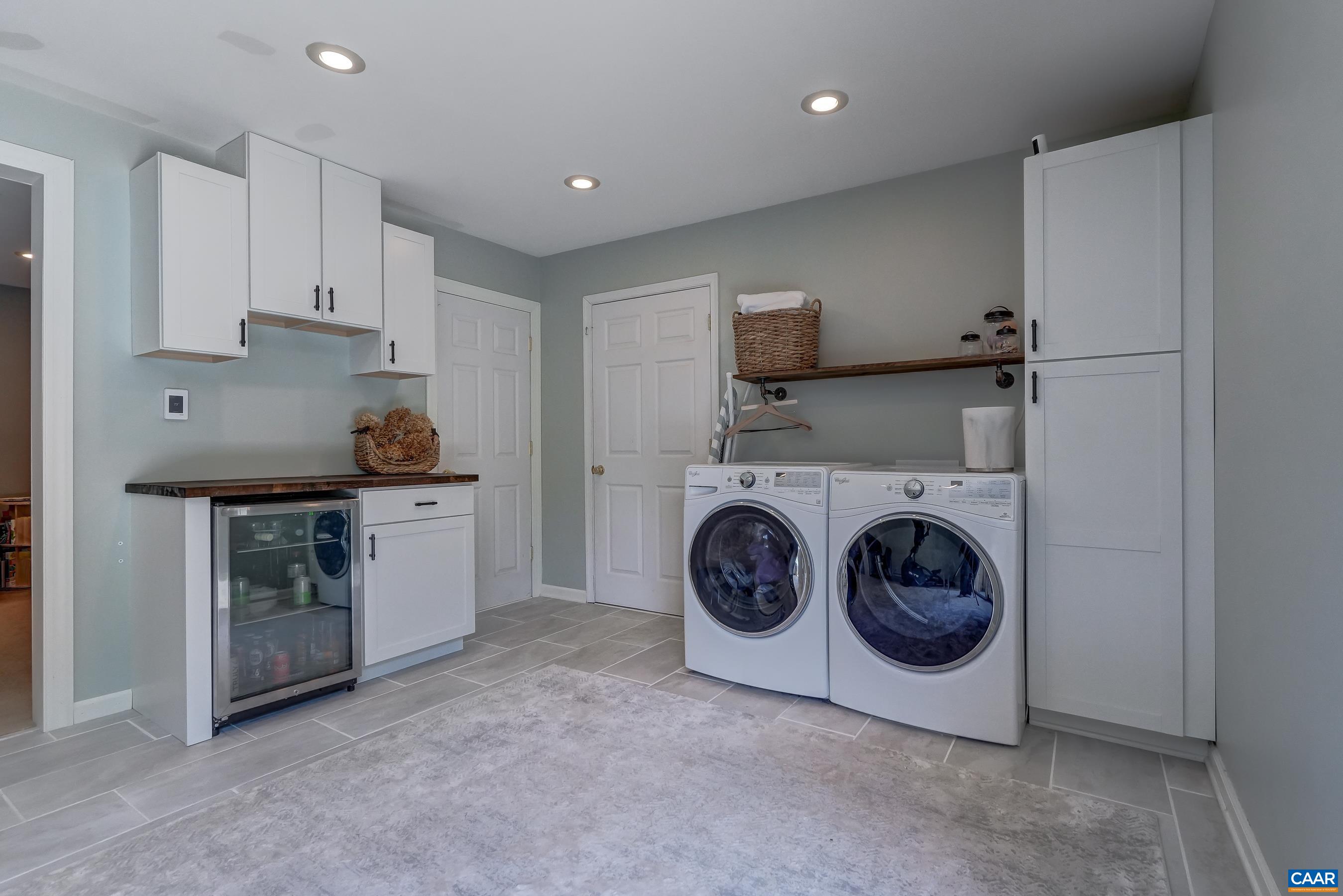 1069 Amber Ridge Road Charlottesville, VA 22901 - Photo 35 of 46 a utility room with sink dryer and washer