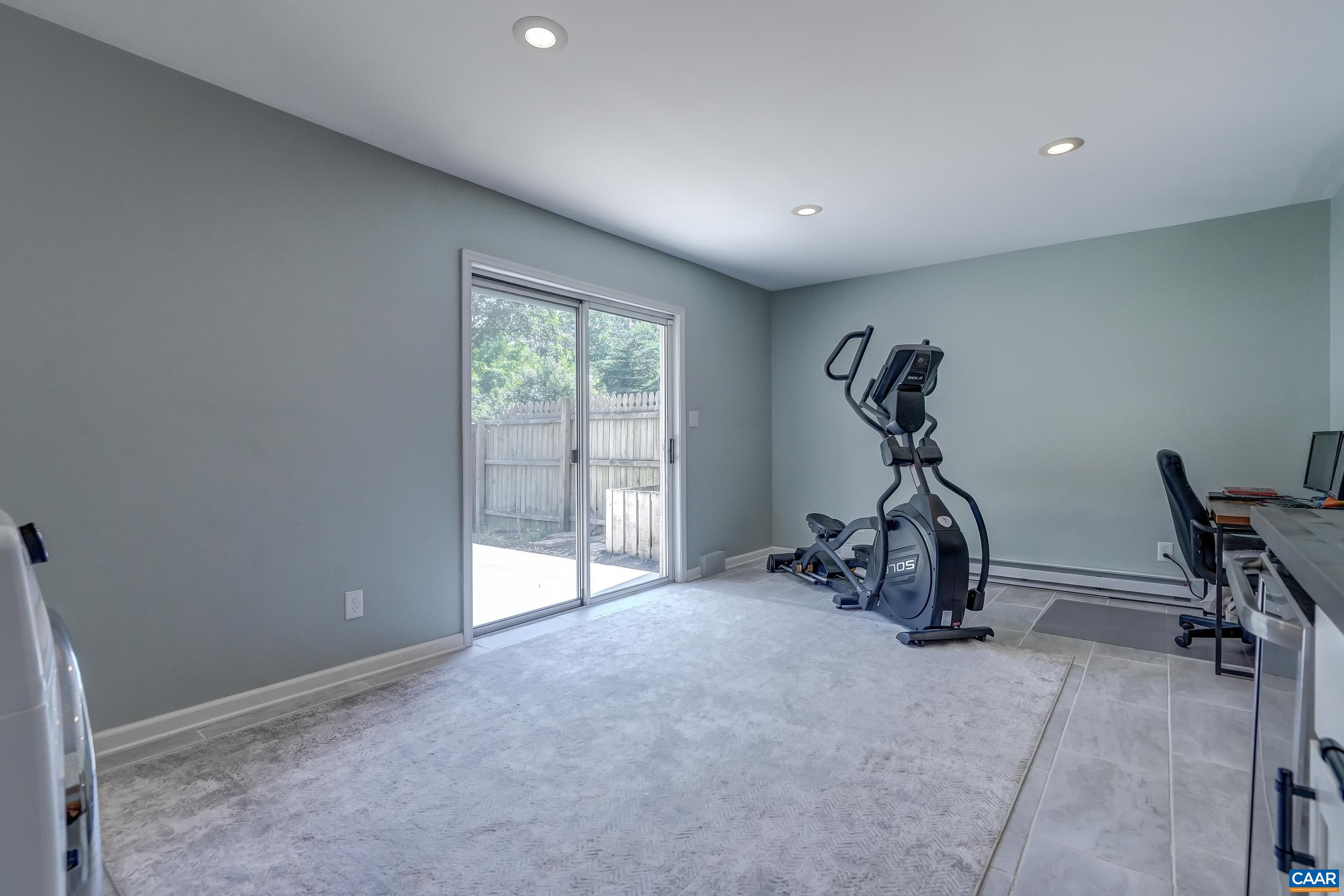 1069 Amber Ridge Road Charlottesville, VA 22901 - Photo 36 of 46 a view of a room with gym equipment