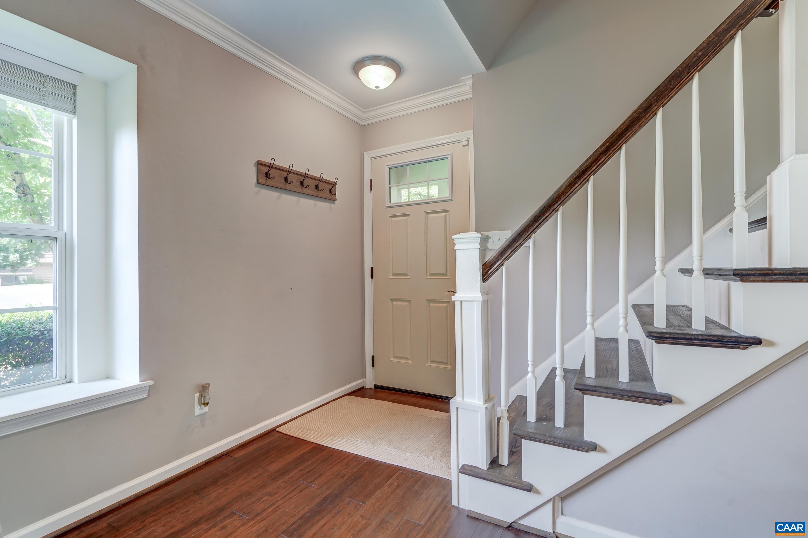 1069 Amber Ridge Road Charlottesville, VA 22901 - Photo 8 of 46 a view of staircase with wooden floor and white walls