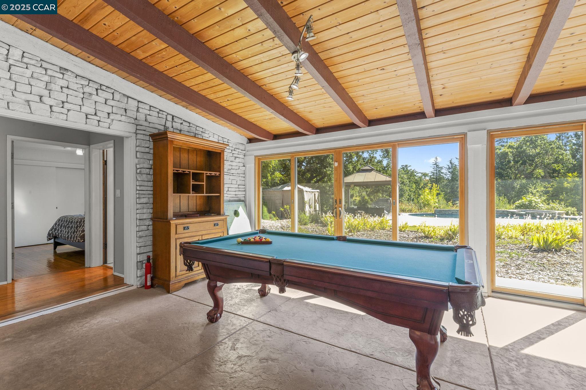 1910 San Miguel Drive Walnut Creek, CA 94596 - Photo 12 of 58 a room with pool table and windows