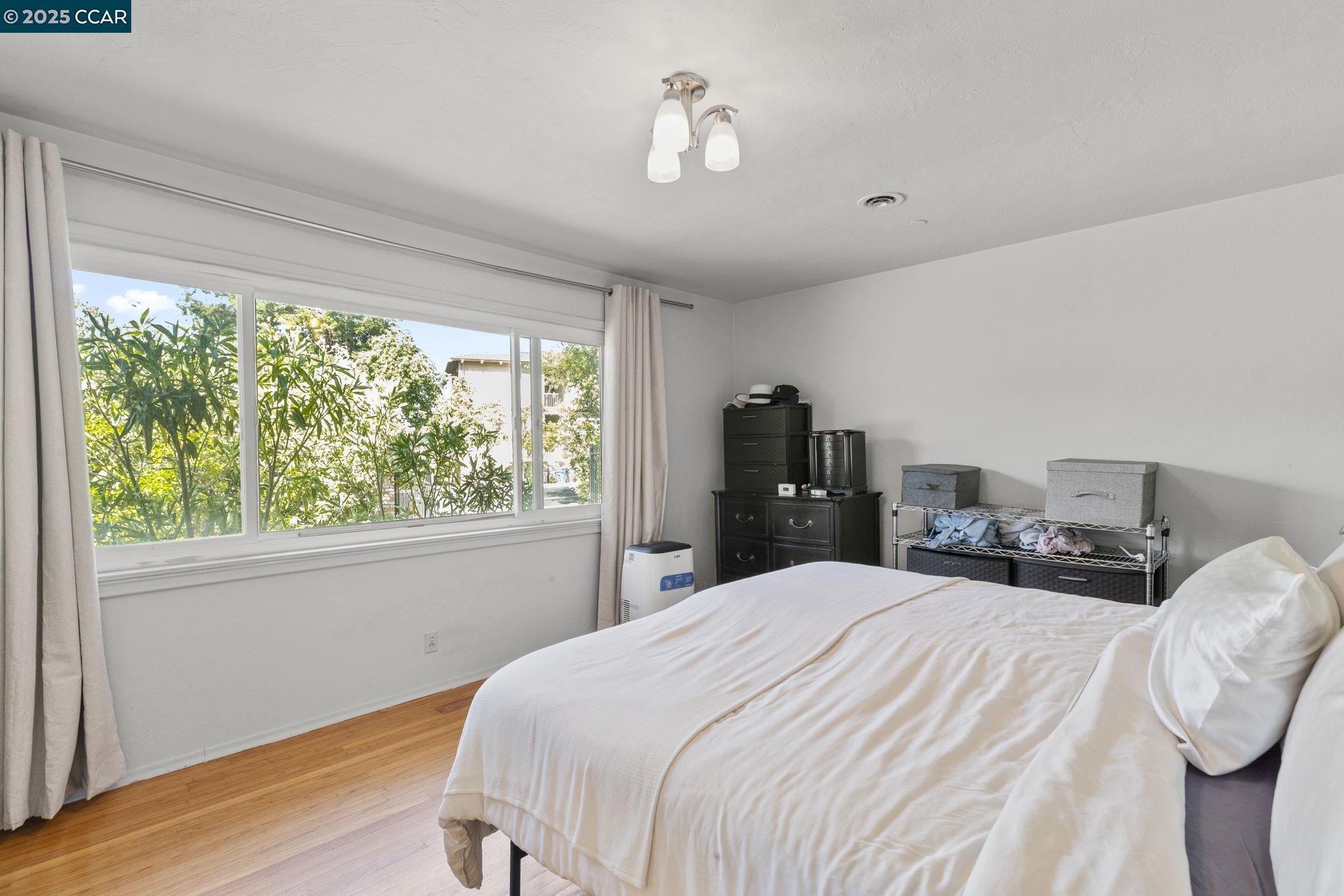 1910 San Miguel Drive Walnut Creek, CA 94596 - Photo 23 of 58 a bedroom with bed and window