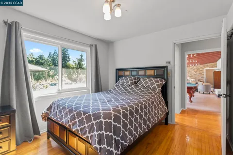 swimming pool view with a seating space