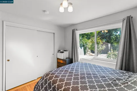a view of a swimming pool with sitting area