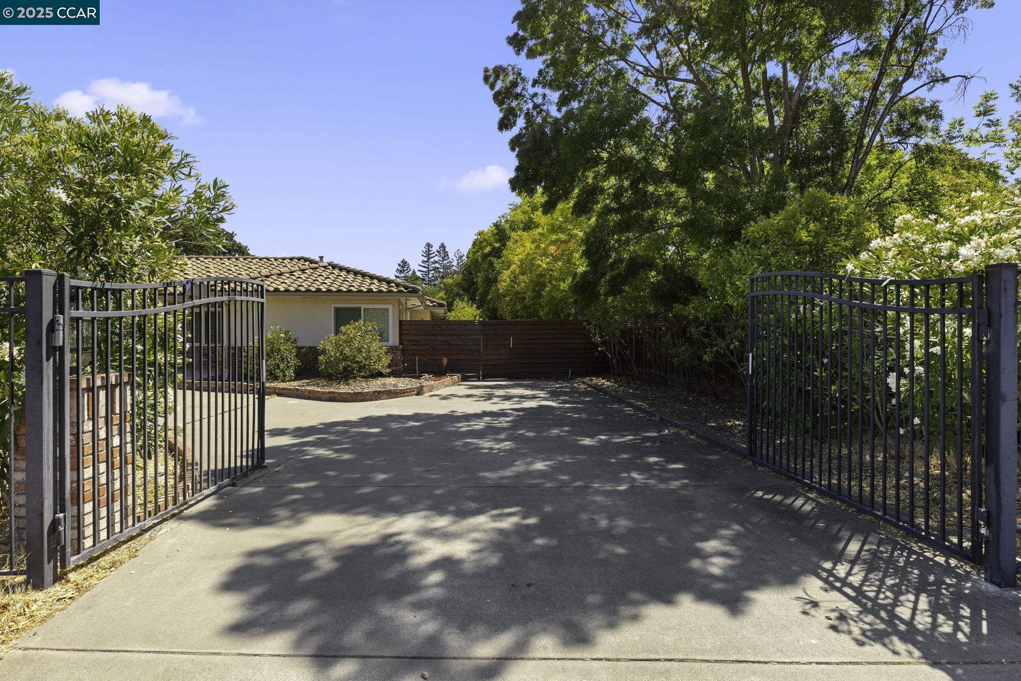 1910 San Miguel Drive Walnut Creek, CA 94596 - Photo 3 of 58 a view of a house with a yard