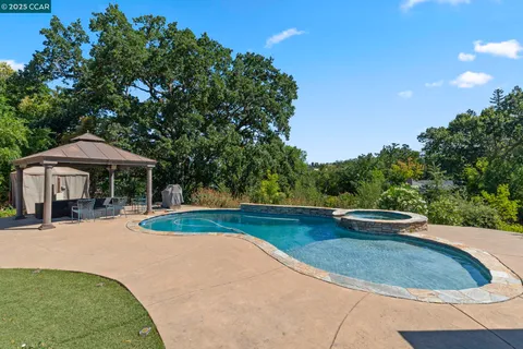 an aerial view of a house having yard