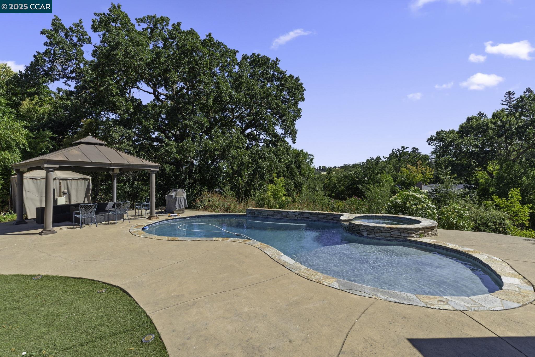 1910 San Miguel Drive Walnut Creek, CA 94596 - Photo 33 of 58 swimming pool view with a seating space