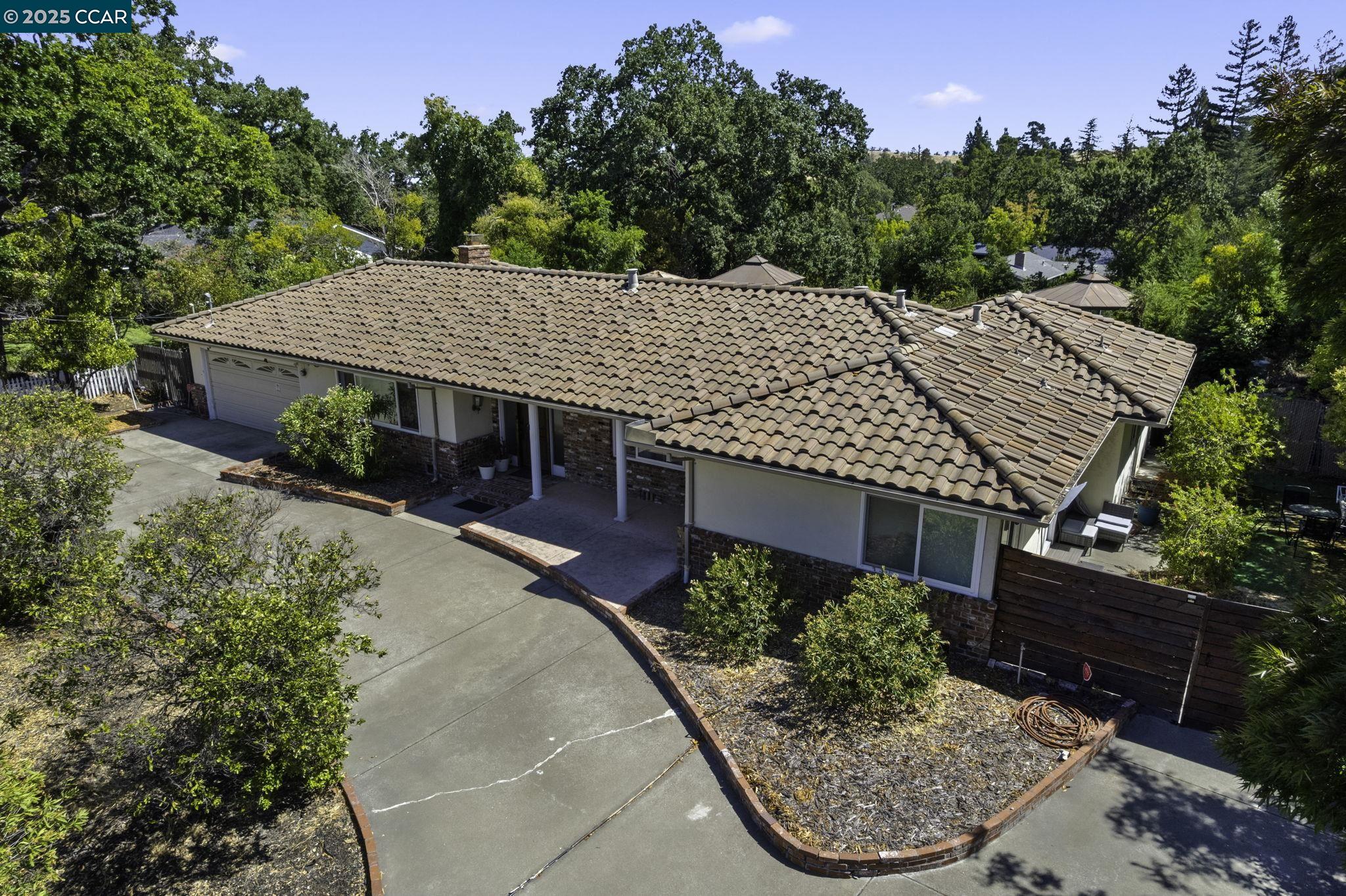 1910 San Miguel Drive Walnut Creek, CA 94596 - Photo 39 of 58 an aerial view of a house having yard
