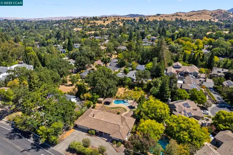 a living room with a couch and a window