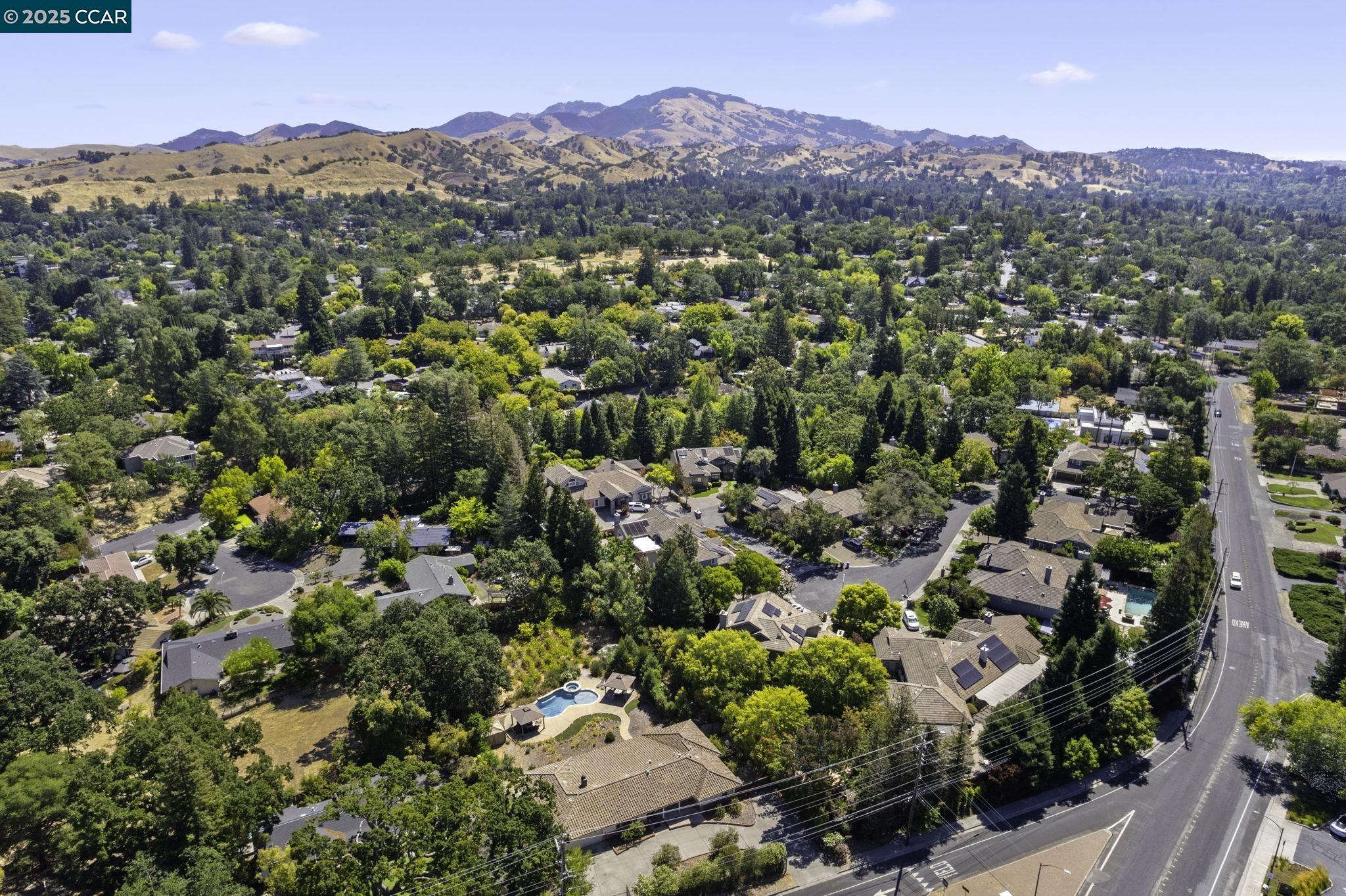 1910 San Miguel Drive Walnut Creek, CA 94596 - Photo 41 of 58 an aerial view of a houses with a street and green space