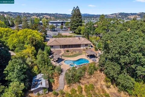 a view of a hallway with washer and dryer