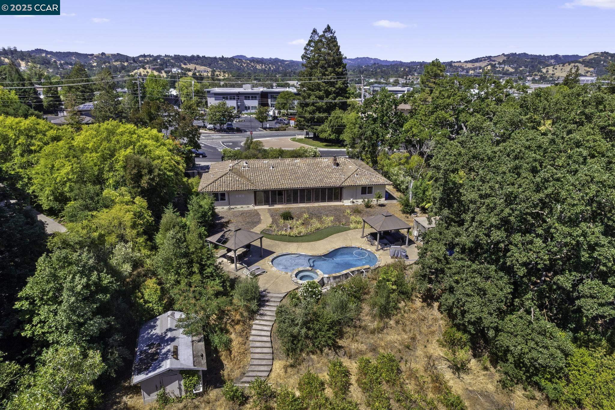 1910 San Miguel Drive Walnut Creek, CA 94596 - Photo 44 of 58 an aerial view of residential houses with outdoor space and trees