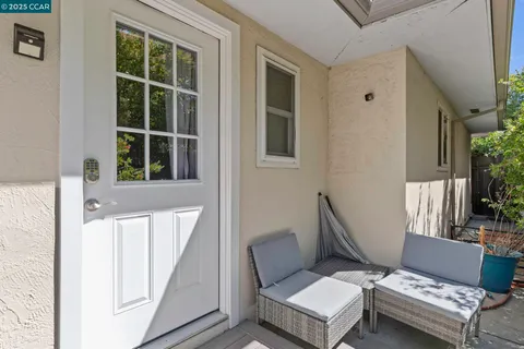 a bathroom with a mirror vanity and a shower