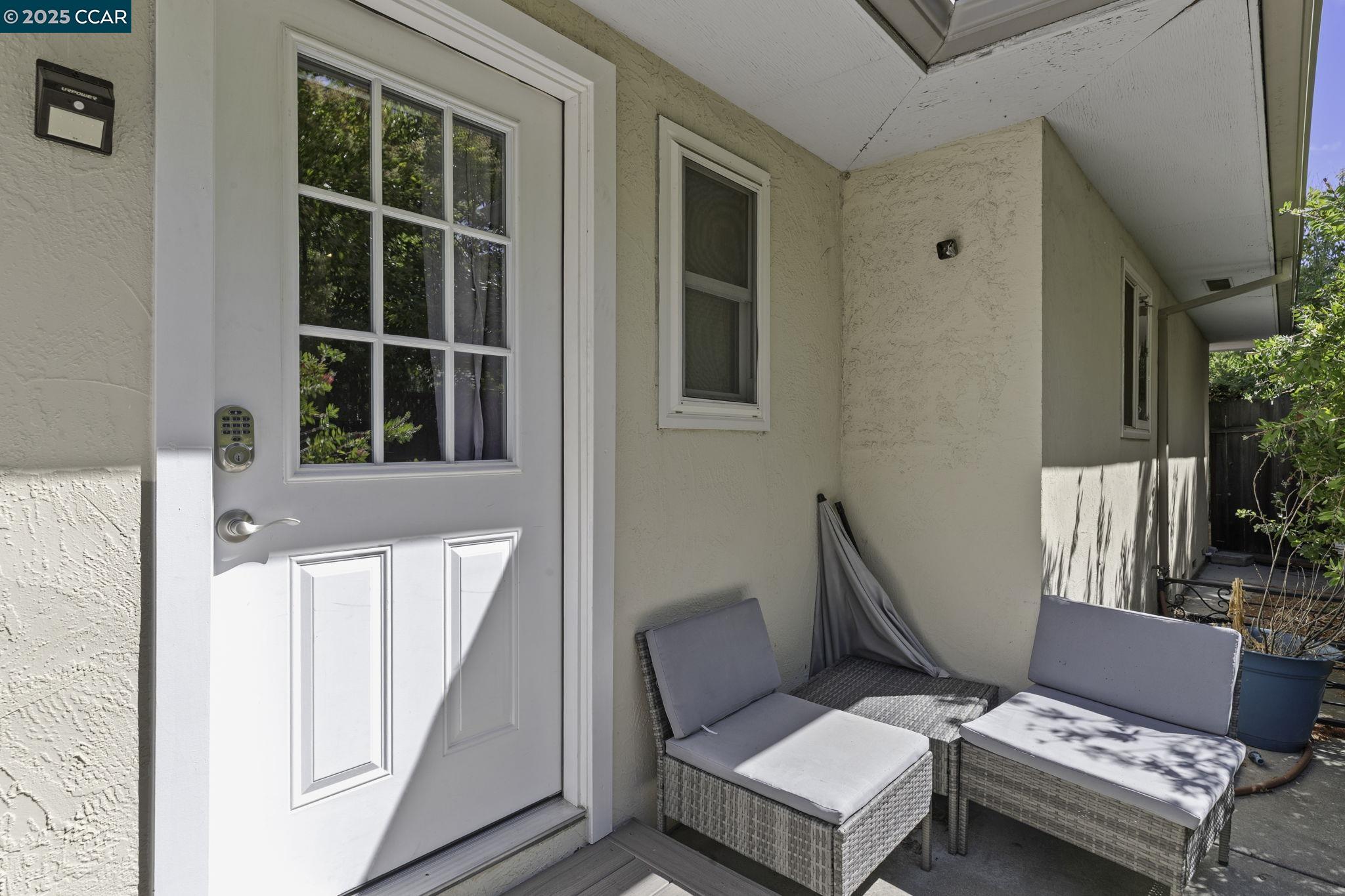 1910 San Miguel Drive Walnut Creek, CA 94596 - Photo 48 of 58 a living room with a couch and a window
