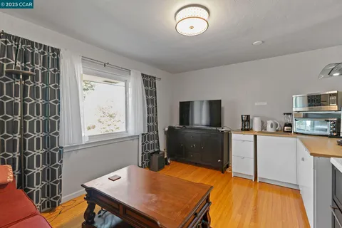 a bathroom with a sink vanity and a mirror